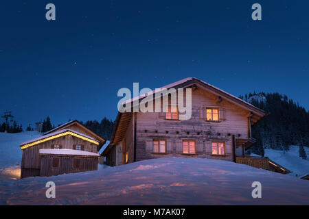 Austria, Montafon, Garfrescha, ski hut during the 'blue hour'. Stock Photo