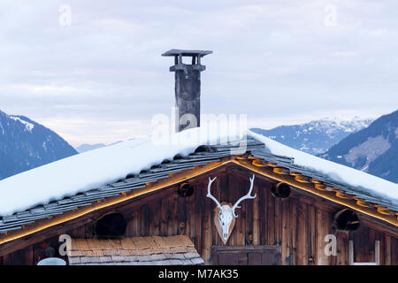 Austria, Montafon, Garfrescha alp village (1550 m), on the upper side of St. Gallenkirch. Quaint ski hut in the alp village. Stock Photo