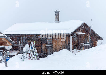 Austria, Montafon, Garfrescha alp village village (1550 m), on the upper side of St. Gallenkirch. Quaint ski hut in the alp village. Stock Photo