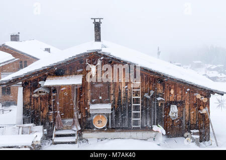 Austria, Montafon, Garfrescha alp village (1550 m), on the upper side of St. Gallenkirch. Quaint ski hut in the alp village. Stock Photo