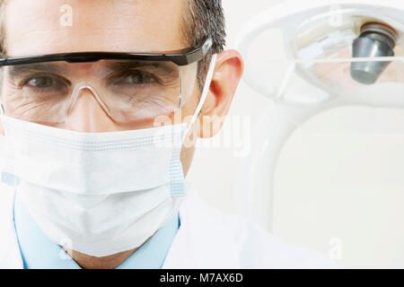 Portrait of a dentist wearing a surgical mask Stock Photo