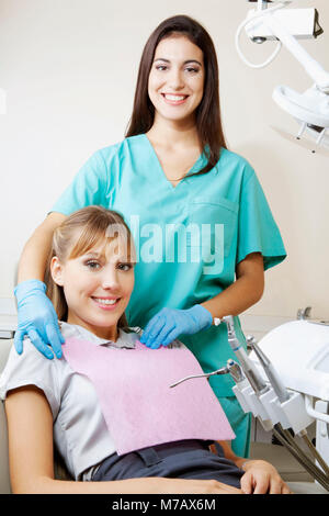 Female dentist with patient in a clinic Stock Photo