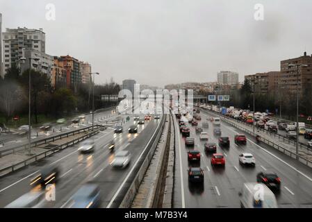 Madrid, Spain. 9th Mar, 2018. Vehicles run on the M-30 ring road in Madrid, Spain, on March 9, 2018. A continuous procedure of precipitation takes place over most part of Spain on March 9, due to the affection of westerly wind. Credit: Guo Qiuda/Xinhua/Alamy Live News Stock Photo