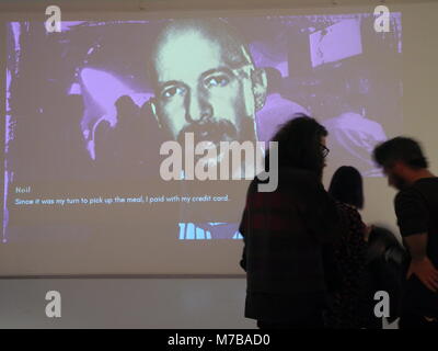 10 January 2018, US, New York City: Visitors observe a simulation of the controversial practice of 'pick-up artistry'. The exhibition 'The Game: The Game' runs until the end of March at the Museum ofthe Moving Image in Queens. Photo: Johannes Schmitt-Tegge/dpa Stock Photo