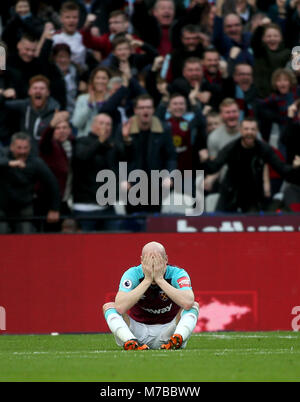 London, UK. 10th March 2018. James Collins of West Ham United looks dejected after Burnley score their second gol during the Premier League match between West Ham United and Burnley played at London Stadium, London, UK. Picture by: Jason Mitchell/Alamy Live News  English Premier and Football League images are only to be used in an editorial context, images are not allowed to be published on another internet site unless a licence has been obtained from DataCo Ltd +44 207 864 9121. Credit: JASON MITCHELL/Alamy Live News Stock Photo