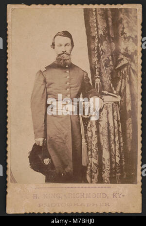 Captain John Wilson of Co. C, 8th Kentucky Infantry Regiment (Union), in uniform with sword; revolver and book rest on table) - H. King, Richmond, Ky., photographer LCCN2015645638 Stock Photo