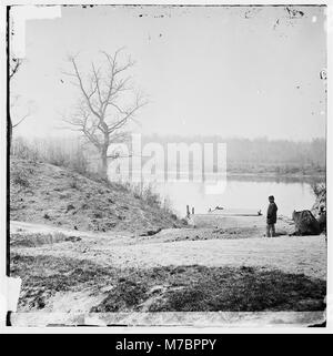 Cox's Landing, located in Virginia, is captured in this historical photograph. The image shows the landing area, likely along a river or waterway, reflecting Virginia's historic waterfront infrastructure and landscape. Stock Photo