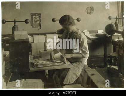15-year old girl at her old job packing the finished envelopes. Embossing shop of Harry C. Taylor, 61 Court Street. LOC nclc.05166 Stock Photo