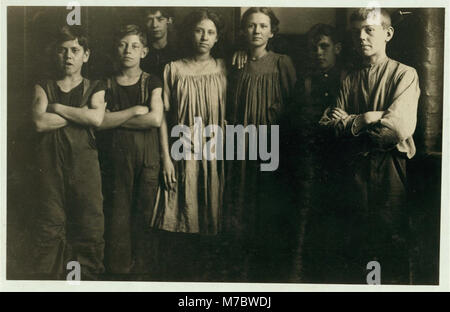 A few of the small girls and boys (not the smallest ones) that I found working in the spinning room of one of the Amoskeag Mfg. Co. mills at Manchester, N.H. Photo taken at 1-00 p.m., May LOC nclc.01738 Stock Photo