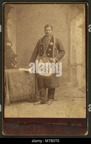 African American man, member of the Grand United Order of Odd Fellows, wearing fraternal order collar and apron) - A.C. Golsh, 411 Main St., opp. Pico House, Los Angeles, Cal LCCN2010652112 Stock Photo