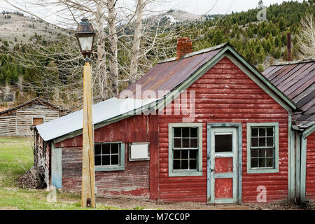 Abandoned houses in a ghost town, Old Trail Town, Cody, Wyoming, USA Stock Photo