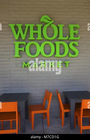 Outdoors Patio with Chairs and Tables in front of Whole Foods Market Organic Grocery Store in Monterey California USA Stock Photo