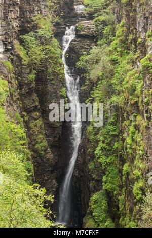Braemore, Scotland - June 8, 2012: Closeup of waterfall of Corrieshalloch Gorge, a deep cut in landscape with forested vertical slopes. Stock Photo