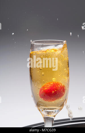 Close-up of a strawberry in a champagne flute Stock Photo