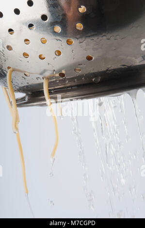 Close-up of boiled spaghetti in a strainer Stock Photo