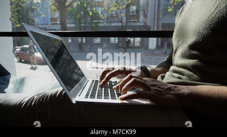 man looking for useful information on Internet  Stock Photo