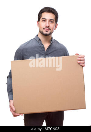 Young attractive man holding an empty board for messages, promotional. Stock Photo