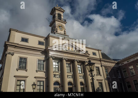 Old city hall in Dordrecht, Netherlands on a sunny afternoon. The sky is blue with clouds. Stock Photo