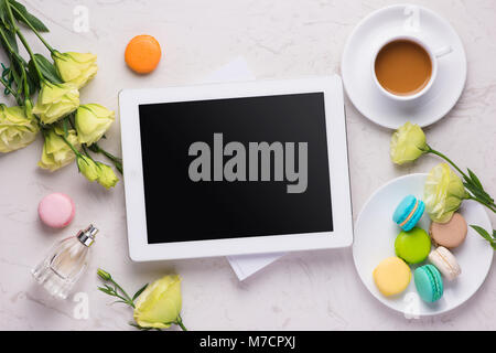 Modern spring design with colorful macaroons on marble background. Top view mock-up Stock Photo