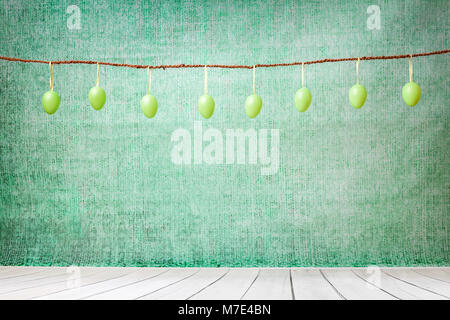 Traditional Easter holiday eggs hanging on a string Stock Photo