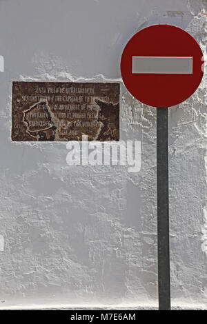 No entry sign against a whitewashed wall in Benalmadena, Costa del Sol, Spain. Stock Photo