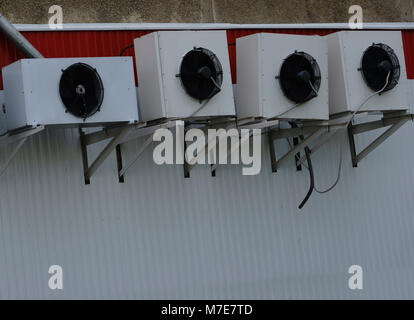 Air conditioner compressor installed in old building Stock Photo