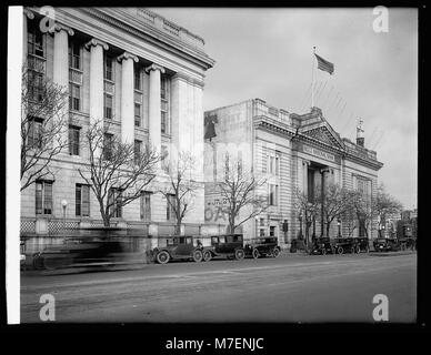 A historic photograph of the Riggs National Bank in Washington, D.C., a significant financial institution in U.S. history, serving the nation's capital for many years. Stock Photo