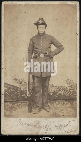 Sergeant Samuel Cole Wright of Co. E, 29th Massachusetts Infantry Regiment, standing in uniform with revolver and musket in front of painted backdrop) - Union Photographic Gallery, 'Camp LCCN2017659677 Stock Photo