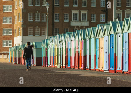 Colourful beach huts on Brighton seafront, East Sussex, England. Stock Photo