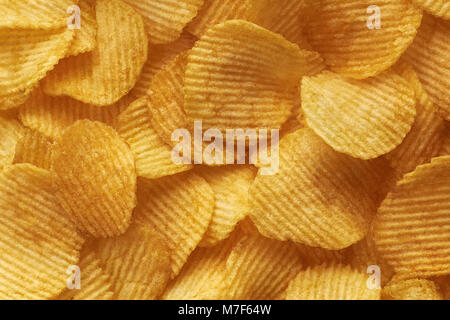 background corrugated golden chips with texture Stock Photo