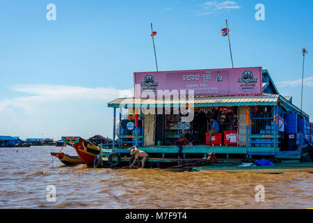 TONLE SAP, CAMBODIA - APRIL 8: Grocery shop on a boat in Tonle Sap floating village. April 2017 Stock Photo