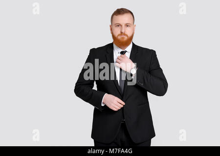 elegant successful man in suit. Business man standing and looking at the camera Stock Photo