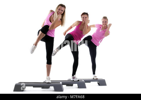 fitness mujeres y hombres haciendo deporte aerobic Stock Photo