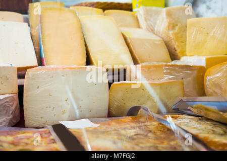 Cheese collection in grocery, close up shot Stock Photo