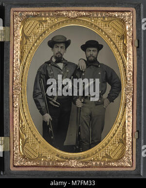 The image shows two Confederate soldiers dressed in lieutenant uniforms ...