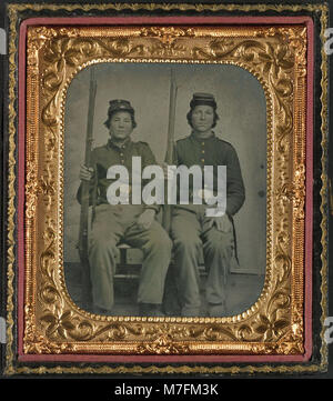 This image features two unidentified soldiers in Union cavalry uniforms ...