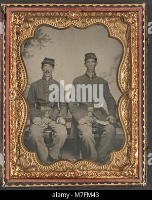 A photograph of two unidentified soldiers dressed in Confederate ...