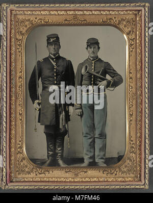 This photograph shows two unidentified soldiers in Union uniforms ...