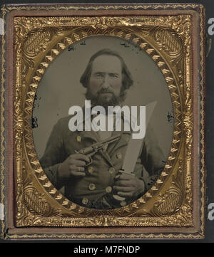 This photograph shows an unidentified Confederate soldier wearing a ...