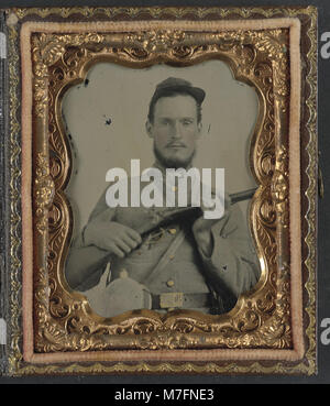 This image features two unidentified soldiers in Confederate uniforms ...
