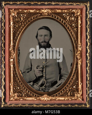 First Lieutenant Job Dillingham Barnard of Co. K, 25th North Carolina Infantry Regiment in uniform with revolver and sword LCCN2016652802 Stock Photo