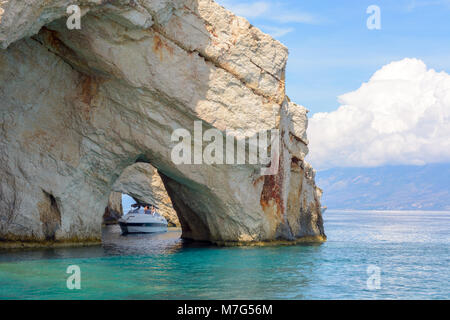 ZAKYNTHOS, GREECE, September 27, 2017: Cruise boat and famous Blue Caves. Zakynthos Island, Greece. Stock Photo