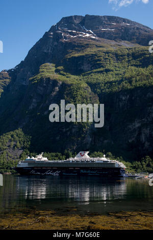 Geirangerfjord is a touristic hotspot in Norway visited by nearly 200 cruise ships like the Mein Schiff 1 in a year.   Das Geirangerfjord ist einer de Stock Photo