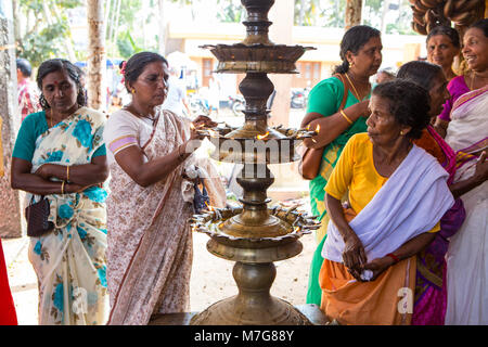 people making prayer offerings at shivratri Stock Photo