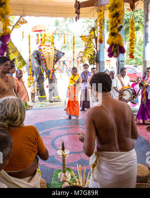 people making prayer offerings at shivratri Stock Photo