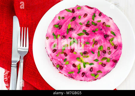 Salad from herring, beets and vegetables Stock Photo