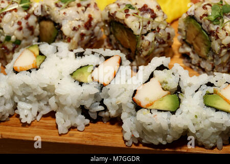 Avocado and crab sushi rolls Stock Photo