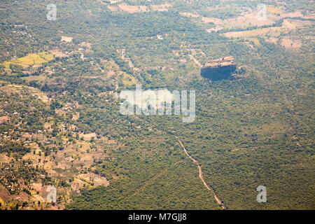 Sigiriya is an ancient palace located in the central Matale District near the town of Dambulla in the Central Province, Sri Lanka. The name refers to  Stock Photo