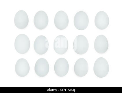 Happy Easter in rows of fifteen stone blue eggs. Stock Photo