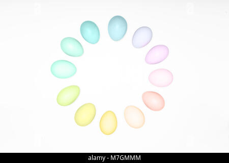 Dozen of white eggs on white background in the circle, copy space. Stock Photo